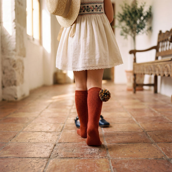 Girl Red Wine High Socks with Borlones — view 2 — handcrafted in Spain — AGÜ Baby