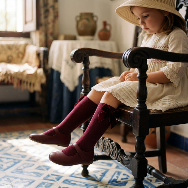 Girl Red Wine High Socks with Side Velvet Bow — view 2 — handcrafted in Spain — AGÜ Baby