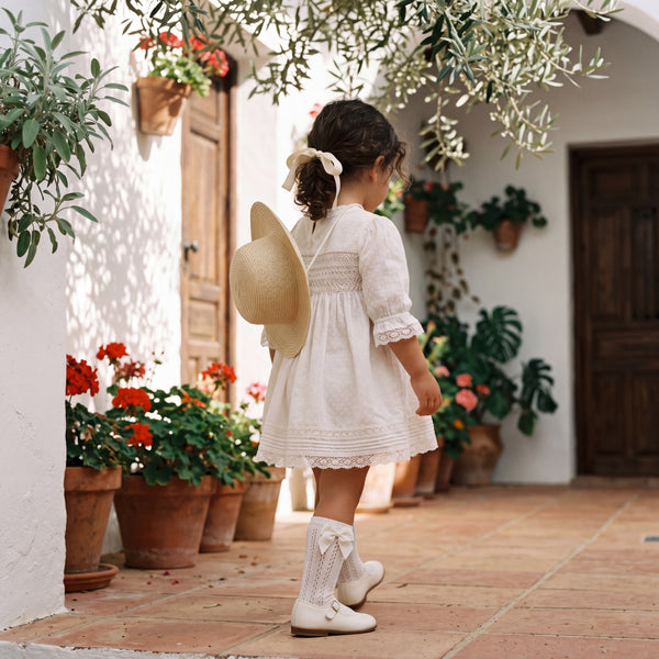 Girls Vanilla Perforated Socks with Bow — view 2 — handcrafted in Spain — AGÜ Baby