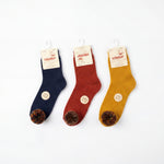 Girl Navy Blue High Socks with Borlones — view 3 — handcrafted in Spain — AGÜ Baby