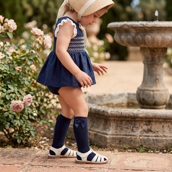 Girls Navy Blue Perforated High Socks with Bow — view 2 — handcrafted in Spain — AGÜ Baby