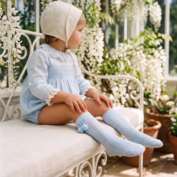 Light Blue Perforated Socks with Borlones — view 2 — handcrafted in Spain — AGÜ Baby
