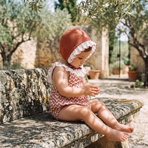 Red Zig Zag Romper — view 2 — handcrafted in Spain — AGÜ Baby