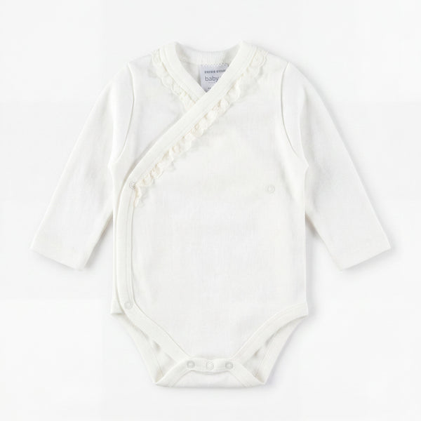 Unisex White Crossed Lace Bodysuit Long Sleeve — view 3 — handcrafted in Spain — AGÜ Baby